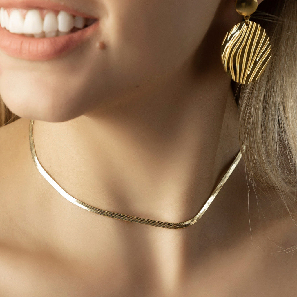 Brinco Pêndulo Orgânico Redondo com Textura Ondulada Banhado a Ouro 18K